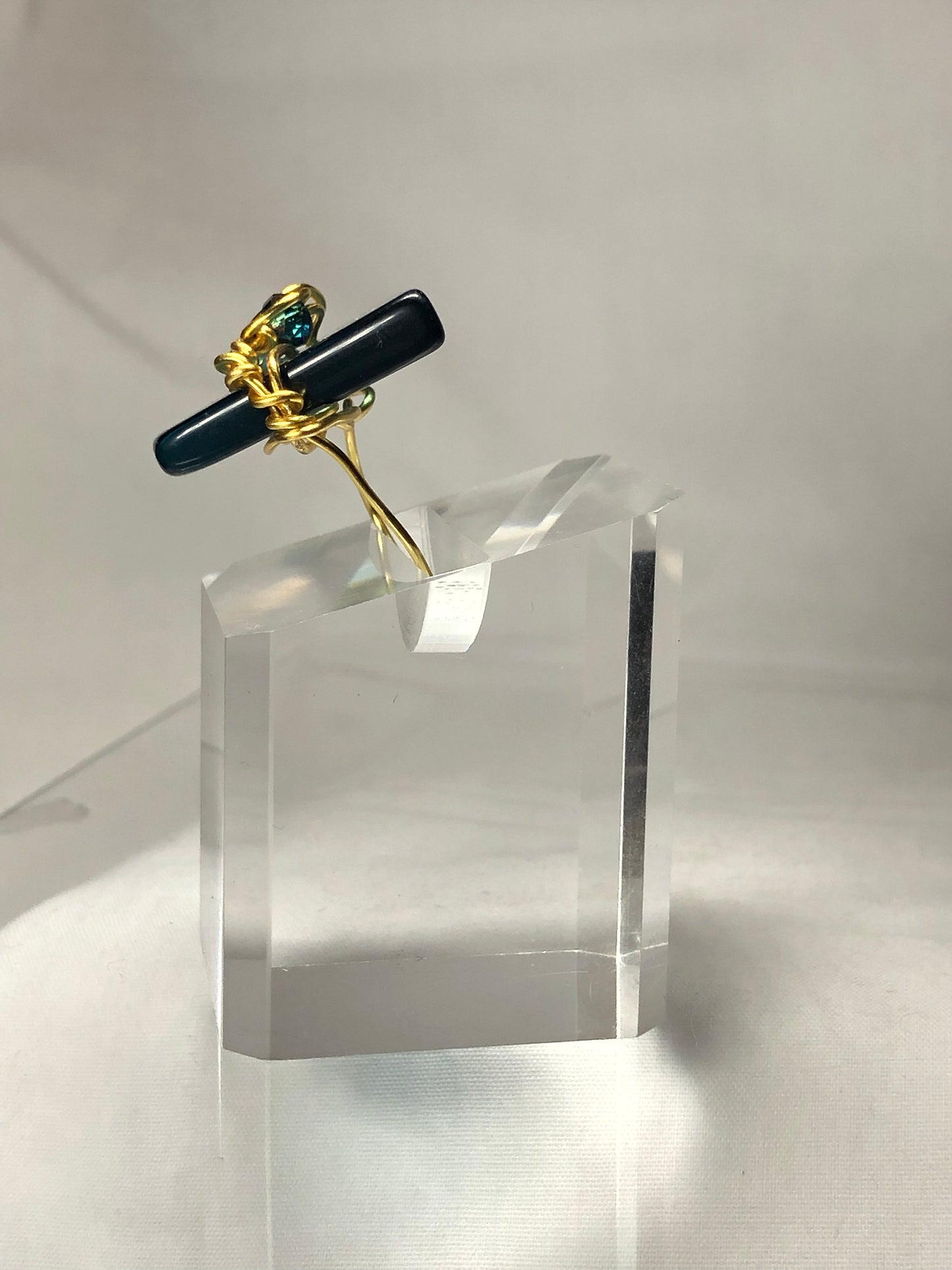 Teal crystal with gold scroll