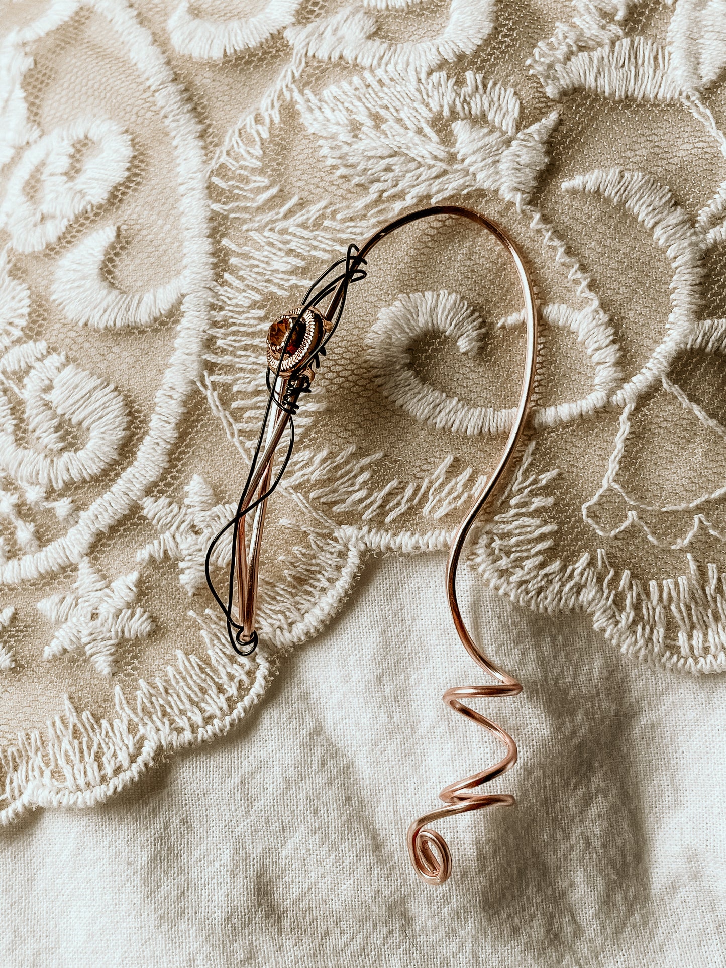 Morganite earcuff with black wire