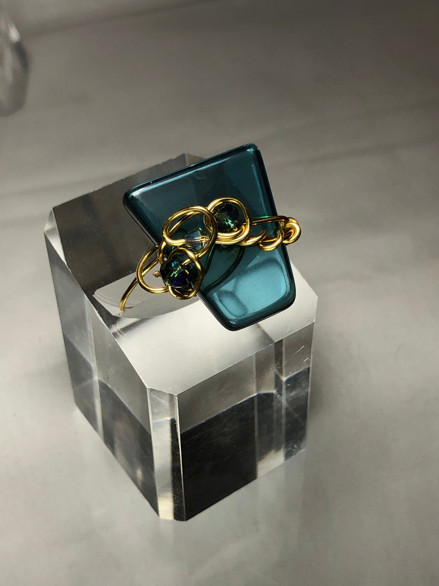 Teal crystal with gold scroll