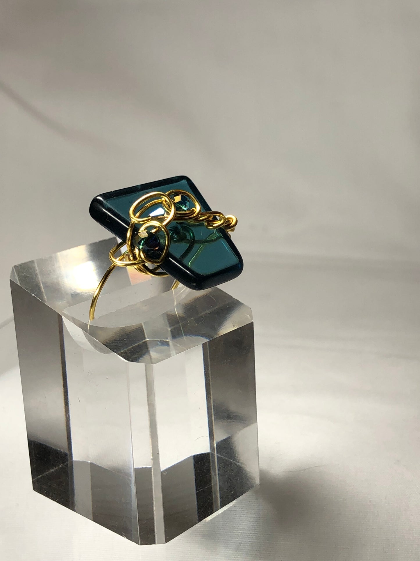 Teal crystal with gold scroll