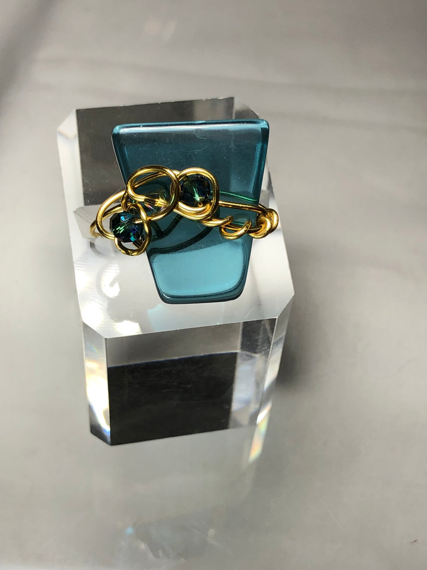Teal crystal with gold scroll