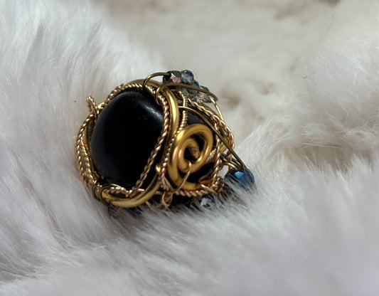 Mahogany obsidian ring ￼: grounded fire