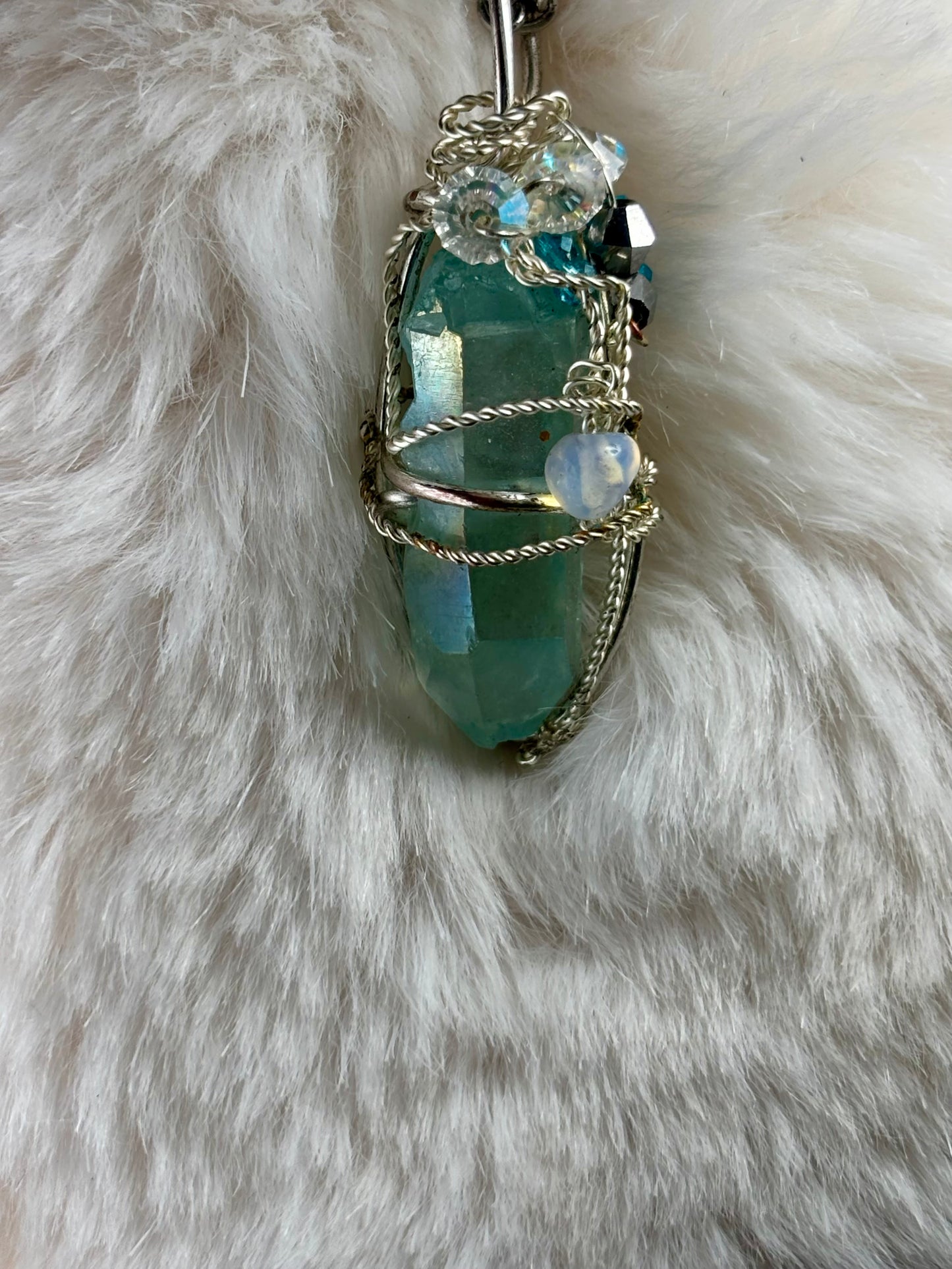 Hidden Prism, Rainbow Magic: green radiated crystal pendant