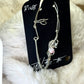 The Phoenix Spark: pink fractured quartz crystal (right) ear cuff￼