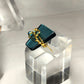 Teal crystal with gold scroll