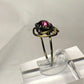 Purple rhinestone ring
