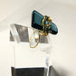 Teal crystal with gold scroll