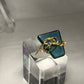 Teal crystal with gold scroll