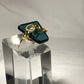 Teal crystal with gold scroll