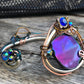 Peacock ore bracelet